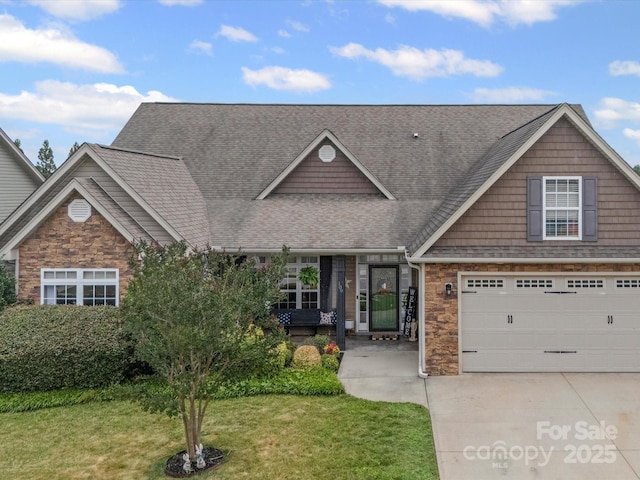 109 Dewfield Ln, Boiling Springs, SC 29316 - view of front of house with a shingled roof, driveway, a front yard, and stone siding