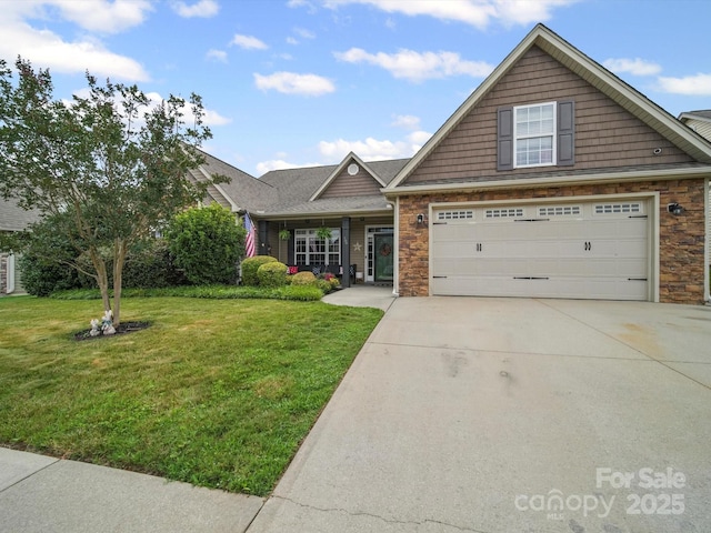 109 Dewfield Ln, Boiling Springs, SC 29316 - view of front of home featuring driveway, a front yard, a garage, and stone siding