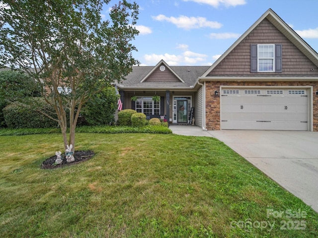 109 Dewfield Ln, Boiling Springs, SC 29316 - view of front facade with concrete driveway, a front yard, a garage, stone siding, and a shingled roof