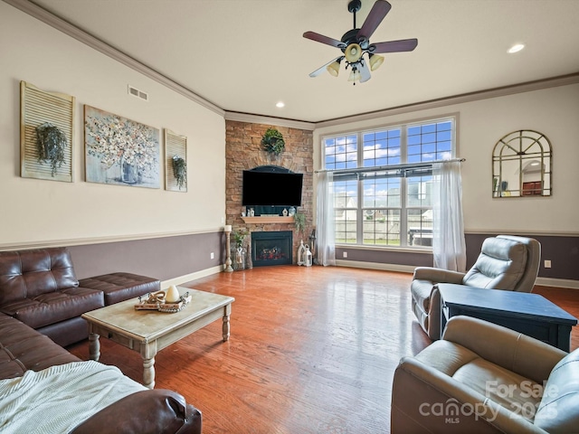 109 Dewfield Ln, Boiling Springs, SC 29316 - living room with crown molding, a ceiling fan, wood finished floors, recessed lighting, and a fireplace