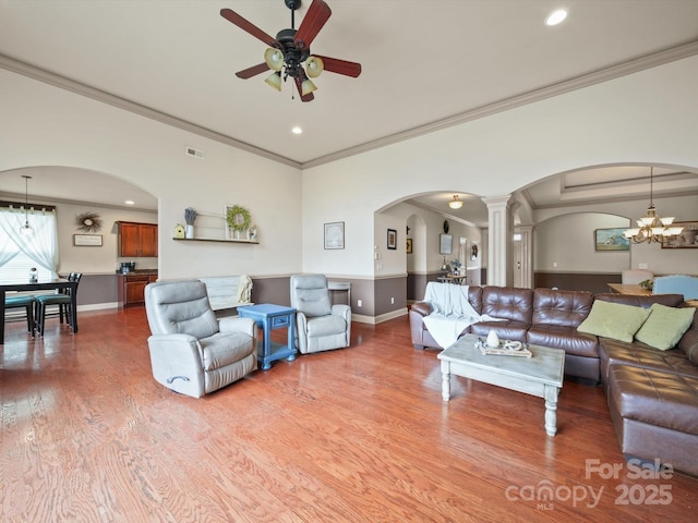 109 Dewfield Ln, Boiling Springs, SC 29316 - living room featuring arched walkways, ceiling fan, light wood finished floors, decorative columns, and recessed lighting