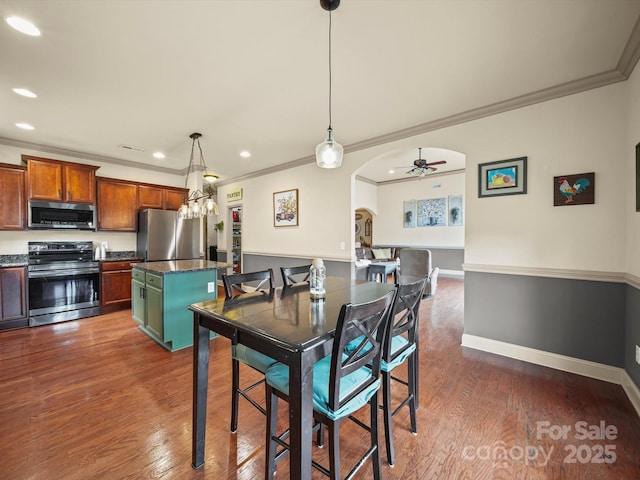 109 Dewfield Ln, Boiling Springs, SC 29316 - dining space featuring arched walkways, crown molding, recessed lighting, dark wood-style flooring, and ceiling fan