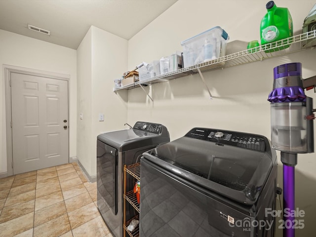 109 Dewfield Ln, Boiling Springs, SC 29316 - laundry room with washing machine and dryer and baseboards