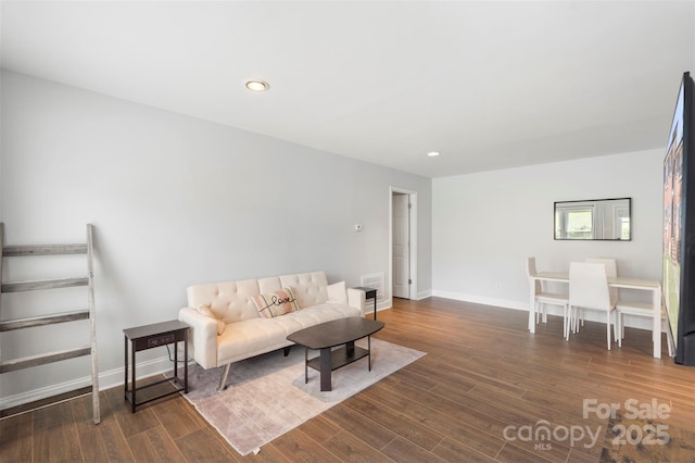718 E Maple Ave, Gastonia, NC 28054 - living room featuring wood finished floors and recessed lighting