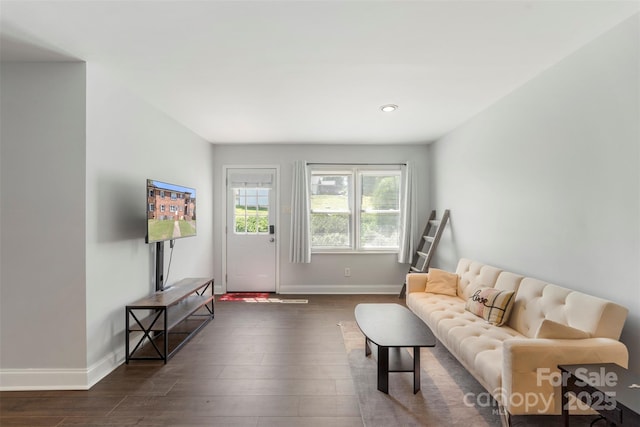 718 E Maple Ave, Gastonia, NC 28054 - living area featuring dark wood finished floors and recessed lighting