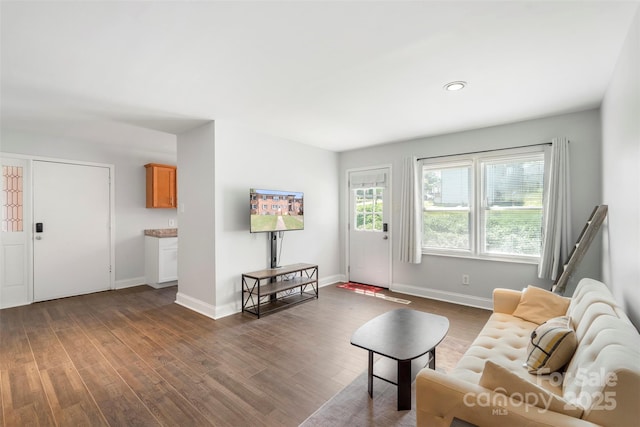 718 E Maple Ave, Gastonia, NC 28054 - living area with dark wood finished floors and recessed lighting