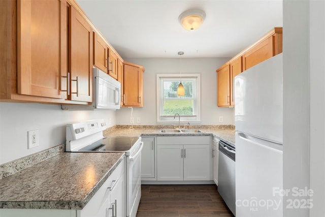 718 E Maple Ave, Gastonia, NC 28054 - kitchen featuring white appliances, dark wood-style flooring, and decorative light fixtures