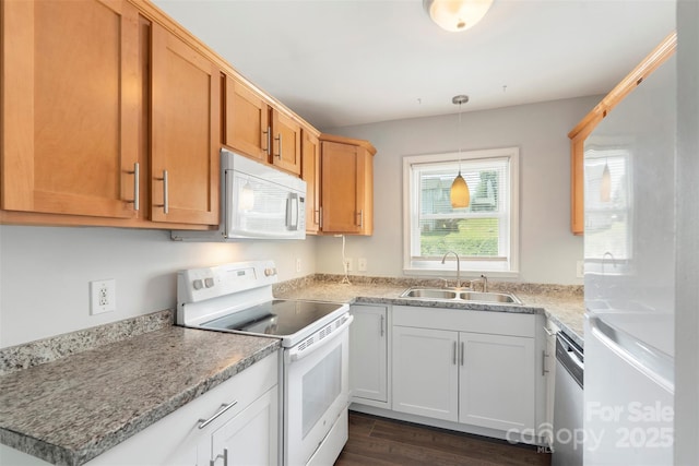 718 E Maple Ave, Gastonia, NC 28054 - kitchen with white appliances, dark wood-type flooring, and pendant lighting