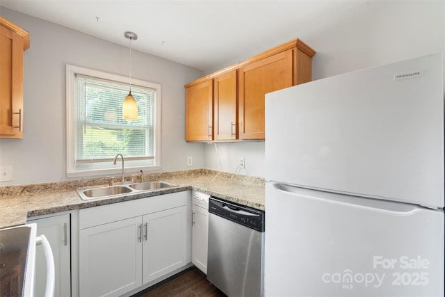 718 E Maple Ave, Gastonia, NC 28054 - kitchen with freestanding refrigerator, stainless steel dishwasher, dark wood-style floors, light countertops, and hanging light fixtures