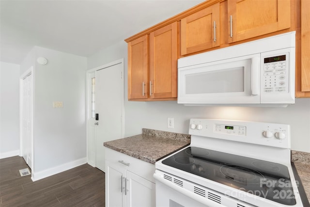 718 E Maple Ave, Gastonia, NC 28054 - kitchen with white appliances and dark wood-type flooring