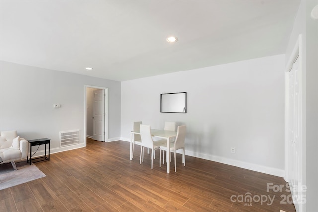 718 E Maple Ave, Gastonia, NC 28054 - dining area with wood finished floors and recessed lighting