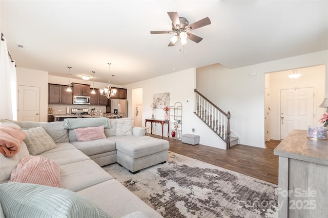 1111 Freeman View Dr, Albemarle, NC 28001 - living area with stairway, wood finished floors, and a ceiling fan