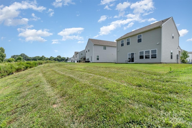 1111 Freeman View Dr, Albemarle, NC 28001 - rear view of property with a yard