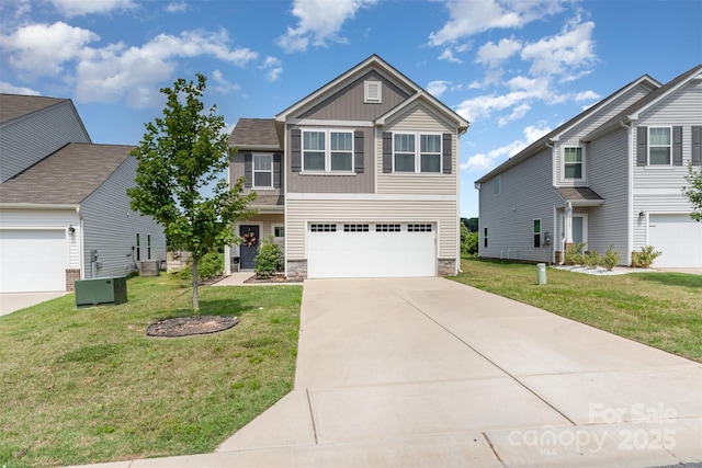 1111 Freeman View Dr, Albemarle, NC 28001 - craftsman-style home with board and batten siding, driveway, stone siding, a front yard, and an attached garage