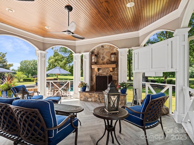 11624 Glenn Abbey Way, Charlotte, NC 28277 - view of patio featuring ceiling fan and an outdoor living space with a fireplace
