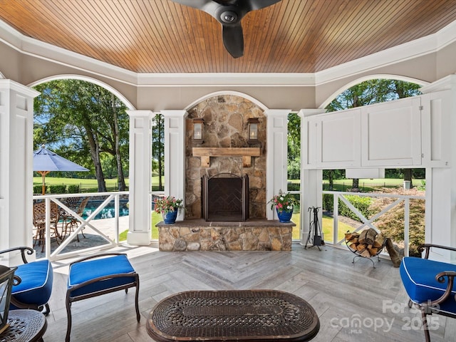 11624 Glenn Abbey Way, Charlotte, NC 28277 - view of patio / terrace with an outdoor stone fireplace, an outdoor pool, and a ceiling fan