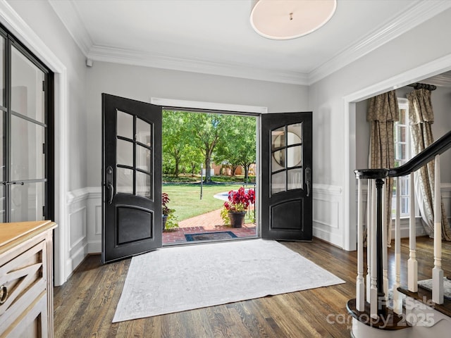 11624 Glenn Abbey Way, Charlotte, NC 28277 - entryway with ornamental molding, a wainscoted wall, dark wood finished floors, and a decorative wall