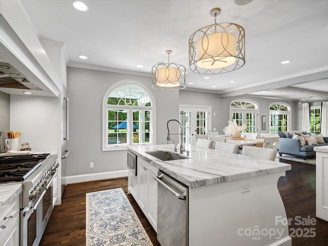 11624 Glenn Abbey Way, Charlotte, NC 28277 - kitchen with appliances with stainless steel finishes, range hood, french doors, recessed lighting, and plenty of natural light