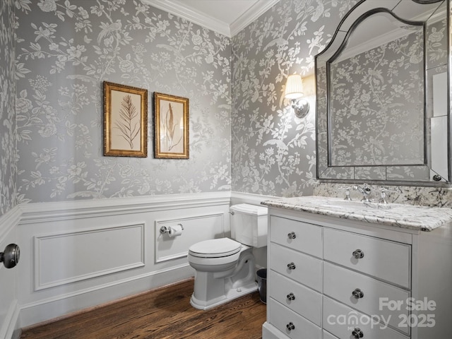11624 Glenn Abbey Way, Charlotte, NC 28277 - half bathroom featuring wood finished floors, wainscoting, vanity, and crown molding
