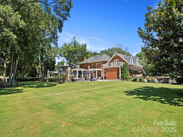 11624 Glenn Abbey Way, Charlotte, NC 28277 - view of front of home with a front lawn and a chimney