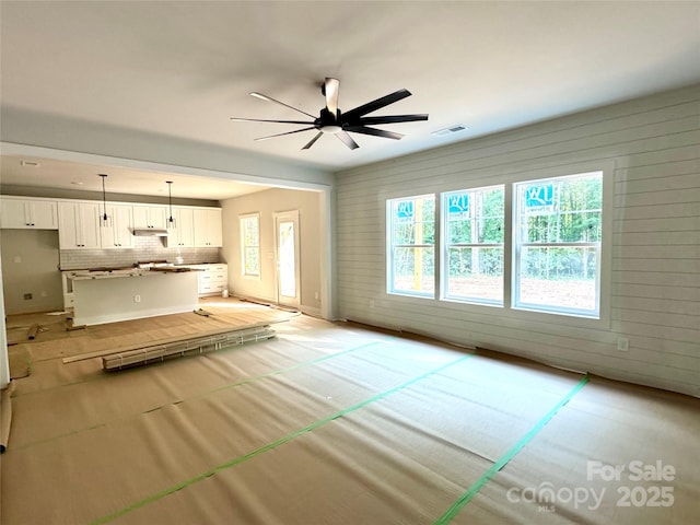 617 Autumnlight Dr, Salisbury, NC 28147 - unfurnished living room with a ceiling fan