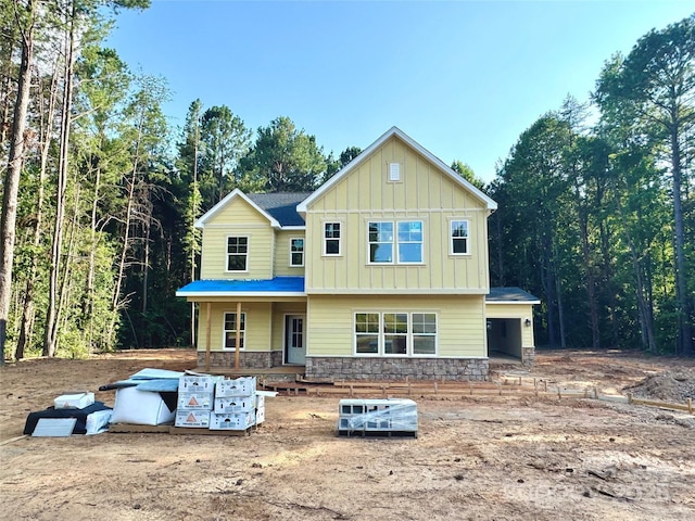 617 Autumnlight Dr, Salisbury, NC 28147 - craftsman-style home with a porch, board and batten siding, and stone siding