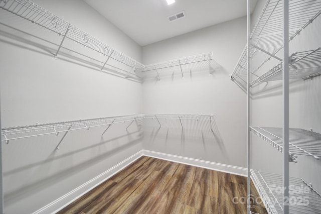 2019 Trailwood Dr, Matthews, NC 28104 - walk in closet with wood finished floors