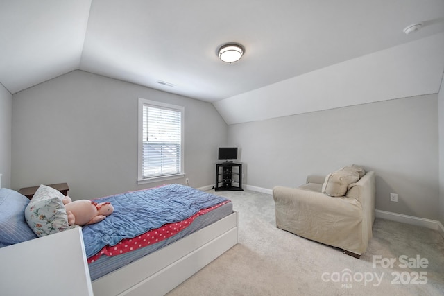 2019 Trailwood Dr, Matthews, NC 28104 - carpeted bedroom featuring vaulted ceiling