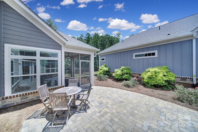 2019 Trailwood Dr, Matthews, NC 28104 - view of patio / terrace featuring a sunroom and outdoor dining space