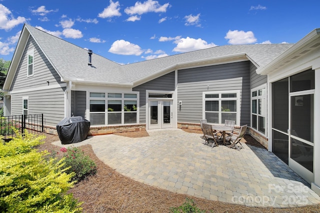 2019 Trailwood Dr, Matthews, NC 28104 - back of house with a patio area and roof with shingles