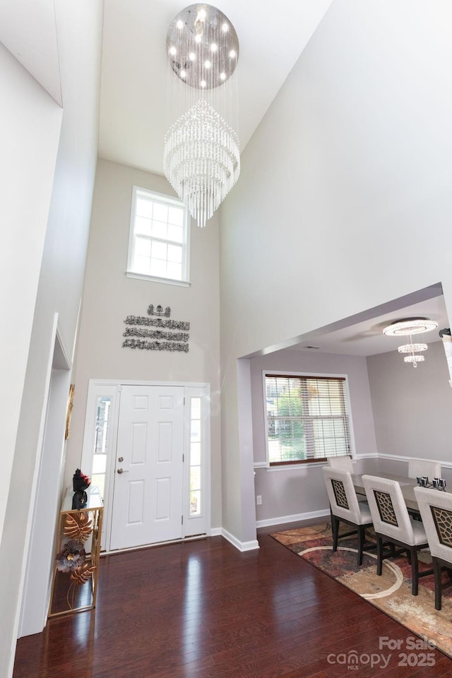 172 Roanoke Rd, Fletcher, NC 28732 - entryway with a chandelier, a towering ceiling, wood finished floors, and plenty of natural light