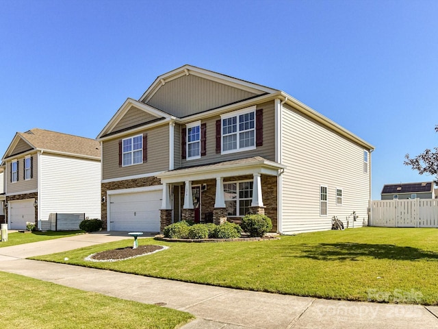1374 Kent Downs Ave SW, Concord, NC 28027 - craftsman house with a garage, concrete driveway, and stone siding
