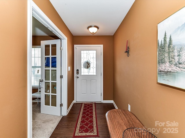 1374 Kent Downs Ave SW, Concord, NC 28027 - entryway featuring dark wood-style floors and baseboards