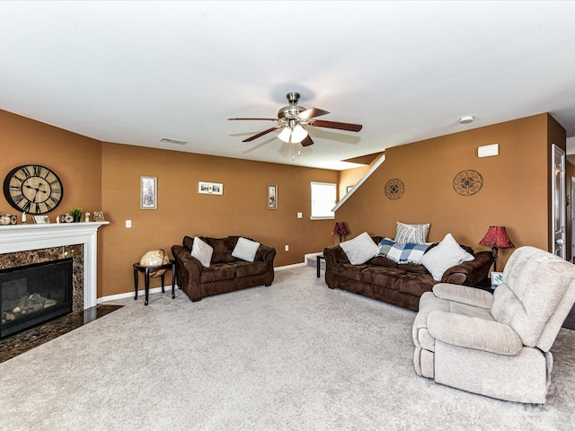 1374 Kent Downs Ave SW, Concord, NC 28027 - carpeted living room featuring ceiling fan and a fireplace