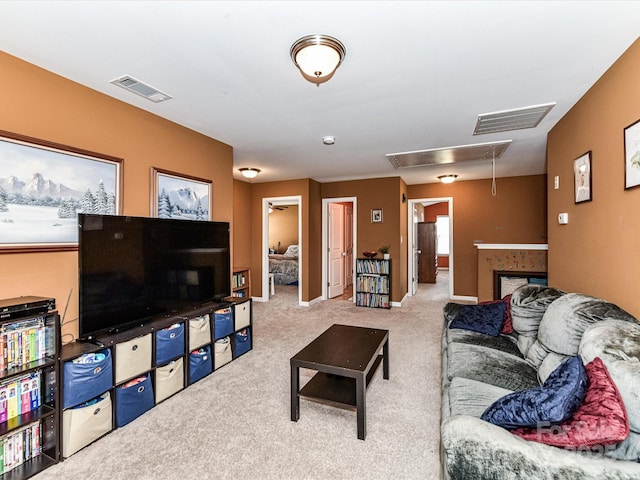 1374 Kent Downs Ave SW, Concord, NC 28027 - carpeted living area featuring attic access