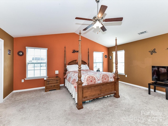 1374 Kent Downs Ave SW, Concord, NC 28027 - bedroom featuring vaulted ceiling, multiple windows, carpet flooring, and a ceiling fan