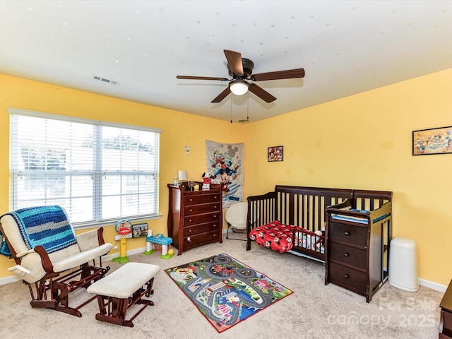1374 Kent Downs Ave SW, Concord, NC 28027 - carpeted bedroom featuring multiple windows and a ceiling fan