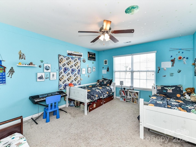 1374 Kent Downs Ave SW, Concord, NC 28027 - carpeted bedroom with a ceiling fan and baseboards