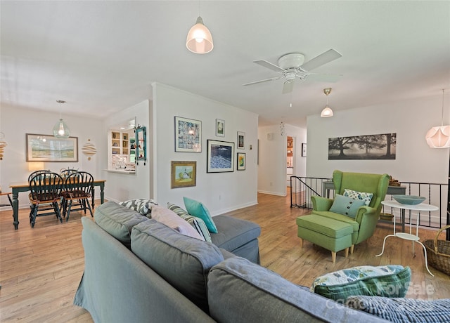 975 Buchanan Loop, Sylva, NC 28779 - living area with a ceiling fan and light wood-style flooring