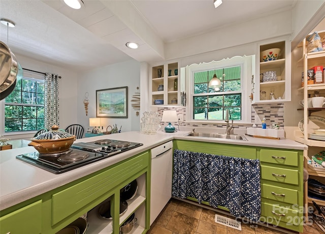 975 Buchanan Loop, Sylva, NC 28779 - kitchen with green cabinets, black electric stovetop, dishwasher, and tasteful backsplash