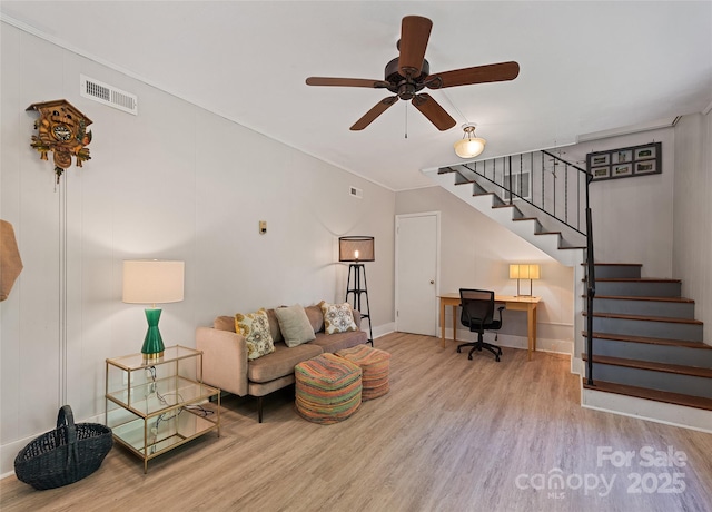 975 Buchanan Loop, Sylva, NC 28779 - living room with wood finished floors, a ceiling fan, and stairs