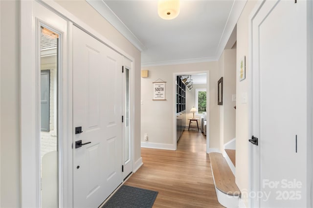 4201 Tyndale Ave, Charlotte, NC 28210 - foyer entrance featuring light wood-style flooring and ornamental molding