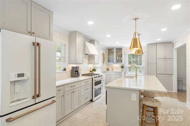4201 Tyndale Ave, Charlotte, NC 28210 - kitchen featuring white appliances, premium range hood, a kitchen breakfast bar, decorative backsplash, and light countertops