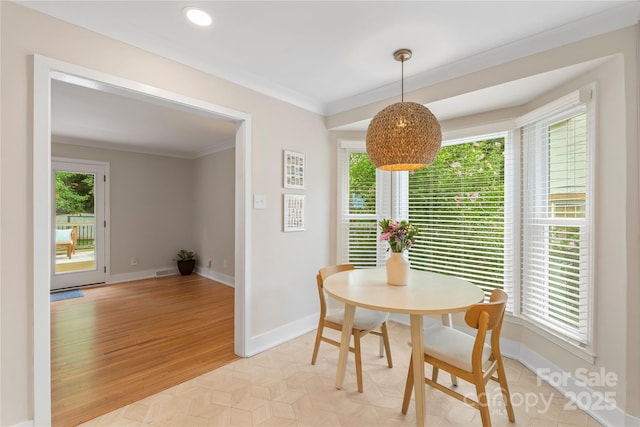 4201 Tyndale Ave, Charlotte, NC 28210 - dining area featuring crown molding, light wood-style flooring, and recessed lighting