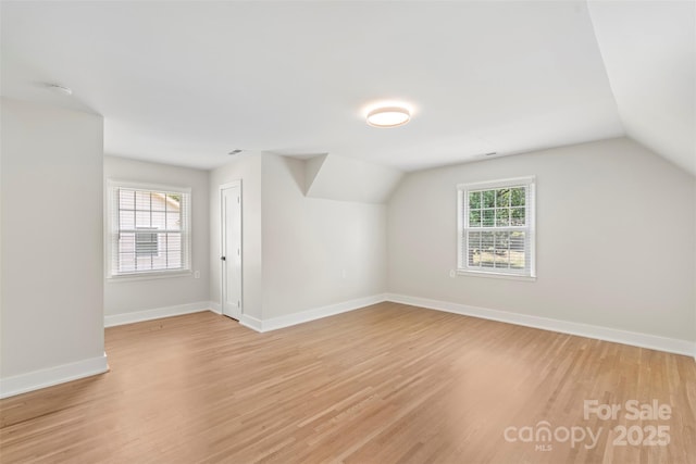 4201 Tyndale Ave, Charlotte, NC 28210 - additional living space featuring light wood finished floors and lofted ceiling