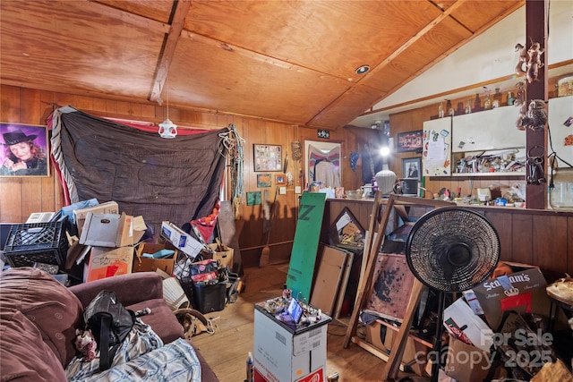 83 Lemon Tree Dr, Sylva, NC 28779 - misc room with wood-type flooring, wooden walls, and lofted ceiling