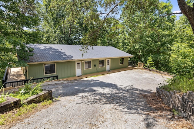 263 Shannons Walk, Lake Lure, NC 28746 - view of front of house featuring gravel driveway and a metal roof