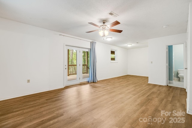 263 Shannons Walk, Lake Lure, NC 28746 - empty room featuring ceiling fan, light wood-style floors, and a textured ceiling