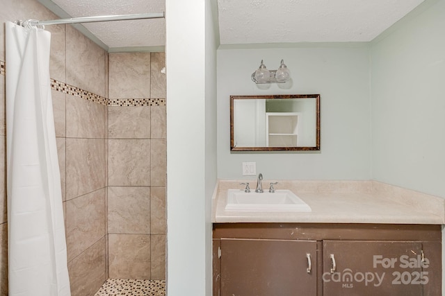 263 Shannons Walk, Lake Lure, NC 28746 - full bathroom featuring tiled shower, vanity, and a textured ceiling
