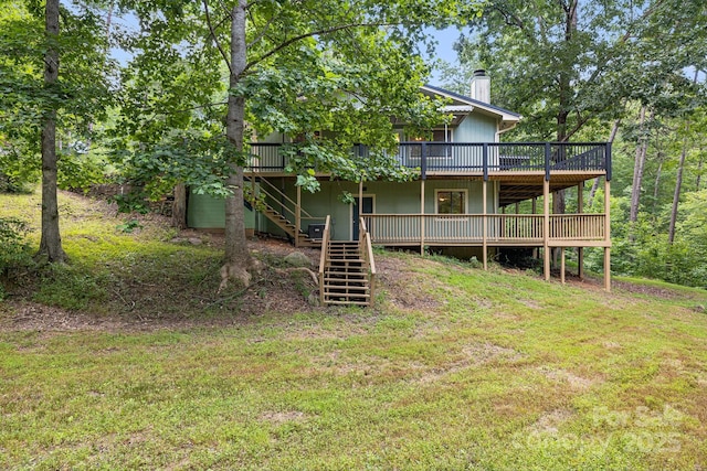 263 Shannons Walk, Lake Lure, NC 28746 - rear view of house featuring stairs, a wooden deck, a chimney, and a yard